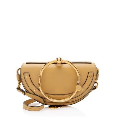 chloe nile minaudiere caramel|CHLOE Calfskin Small Nile Bracelet Minaudiere Bag .